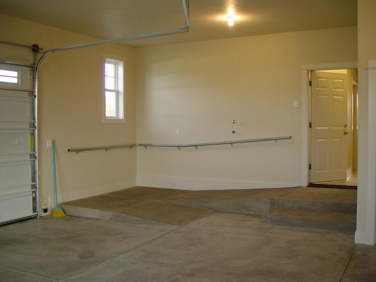 Flush stoop entrance with combinations of stair and wheel access from garage to house. Flush stoop entrance with combinations of stair and wheel access from garage to house.