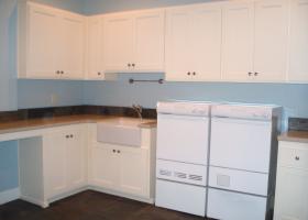 Upstairs laundry/hobby room, with slate floors, silestone counters and apron front sink. Upstairs laundry/hobby room, with slate floors, silestone counters and apron front sink.