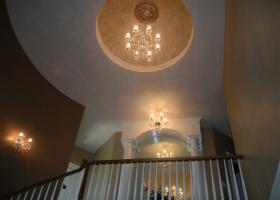 Radius wall and stairs, dome ceiling, rope lighting, custom mirror.