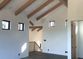 Exposed beam vaulted ceiling.