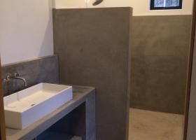 Concrete cabinets, showers and floors.