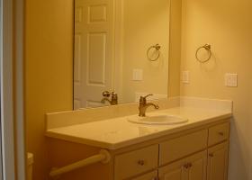 Grab bar on side of cabinet. Grab bar on side of cabinet.