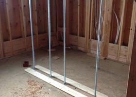 Future concrete wall divider for shower