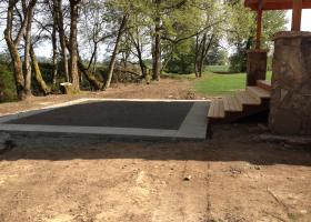 Concrete with boarder trim. 