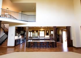 Hand scraped oak hardwood and plush carpet flooring Hand scraped oak hardwood and plush carpet flooring