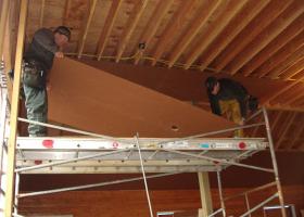 Hard at work! building custom horse facility barn equestrian training