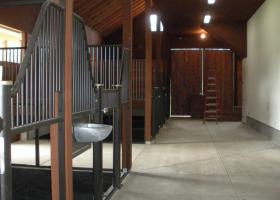 Before the wood paneling went on the stall doors. Custom Stall Door Horse Barn